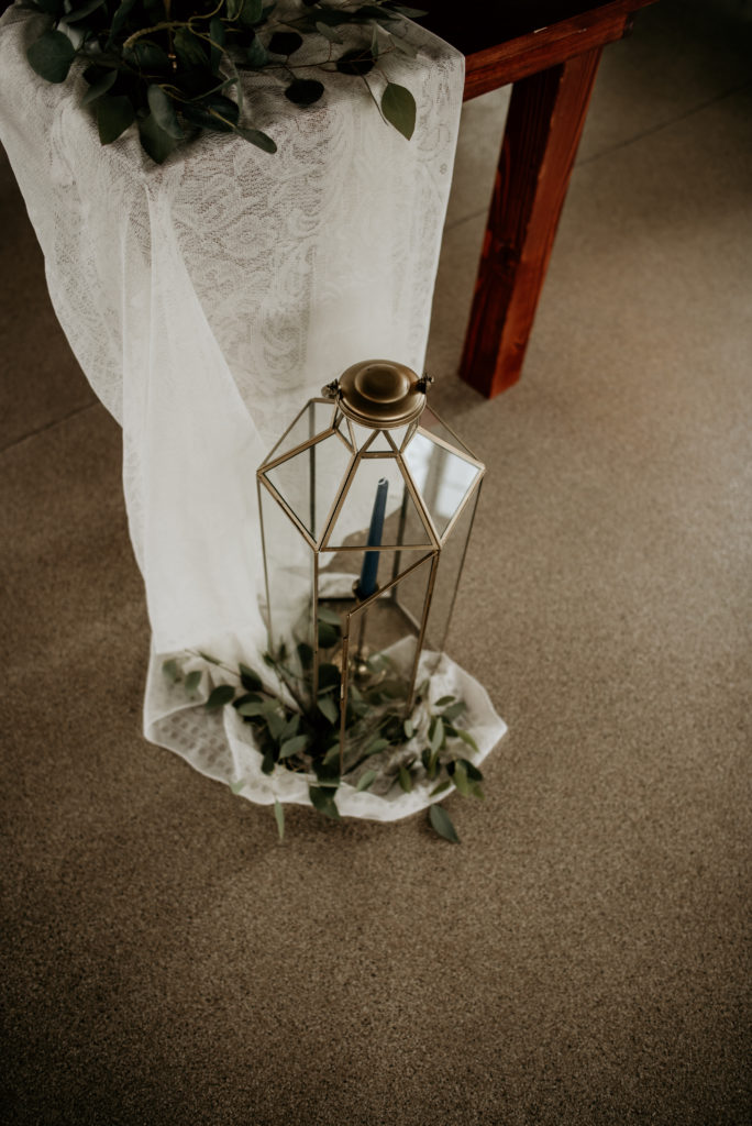 eucalyptus wedding accents with geometrics and candle sticks
