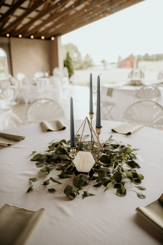 eucalyptus wedding accents with geometrics and candle sticks