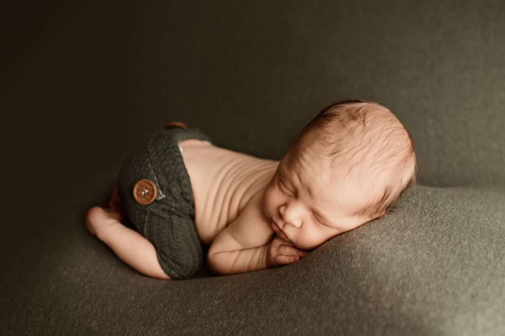Maryland newborn photographer with sleepy baby